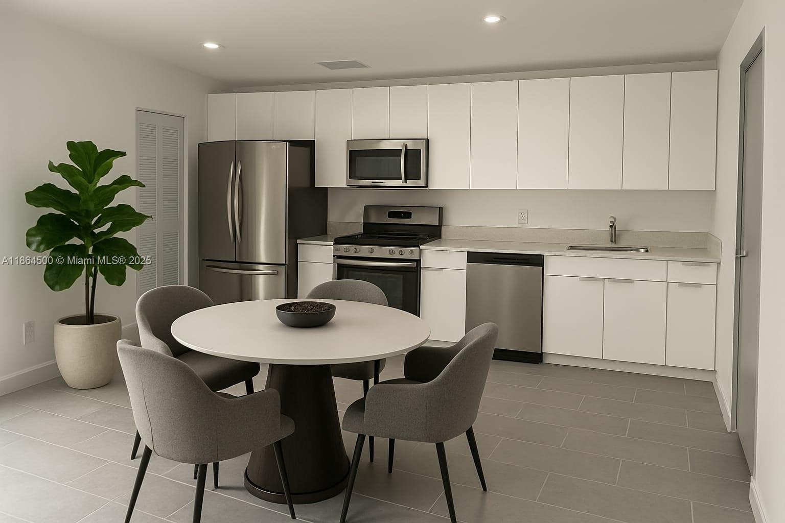 2782 Northwest 46th Street, Unit 5 Miami, FL 33142 - Photo 7 of 18 a kitchen with a table and chairs in it