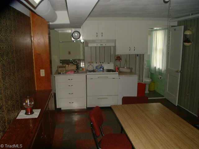 310 Academy Street Rural Hall, NC 27045 - Photo 7 of 8 Other. Basement Kitchen Area