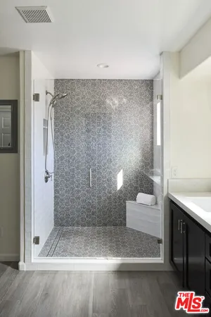 a bathroom with a sink and mirror