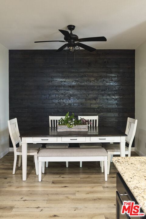 13230 Creekside Lane Poway, CA 92064 - Photo 4 of 23 a view of a chairs and table in a microwave