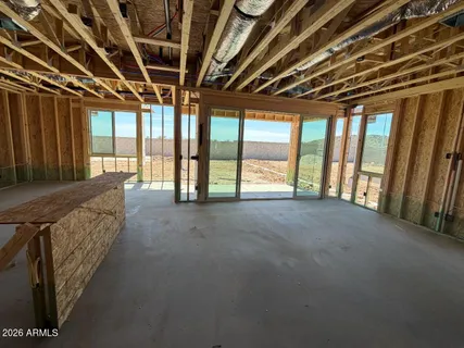 a view of an empty room with a balcony