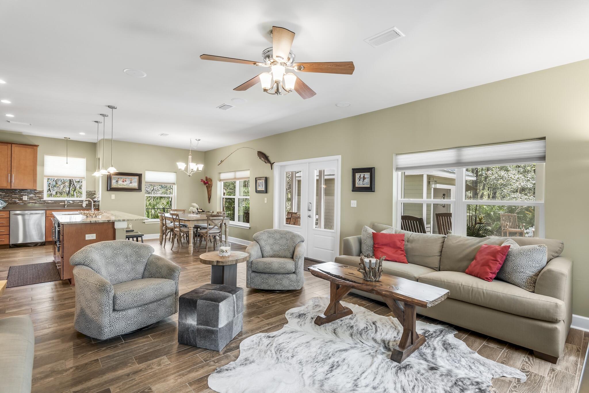 160 Spotted Dolphin Road Santa Rosa Beach, FL 32459 - Photo 19 of 38 a living room with furniture and a large window