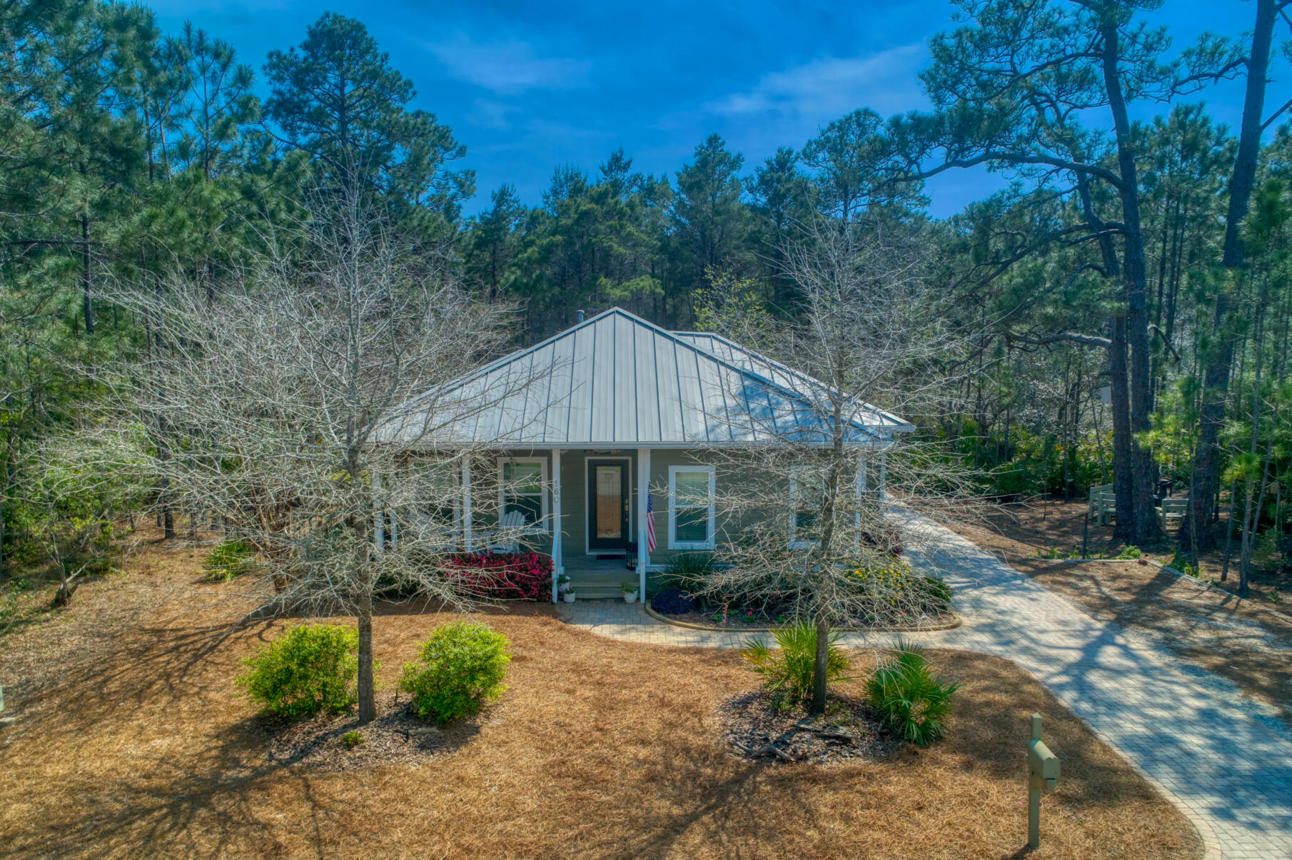 160 Spotted Dolphin Road Santa Rosa Beach, FL 32459 - Photo 5 of 38 a view of a house with backyard and trees