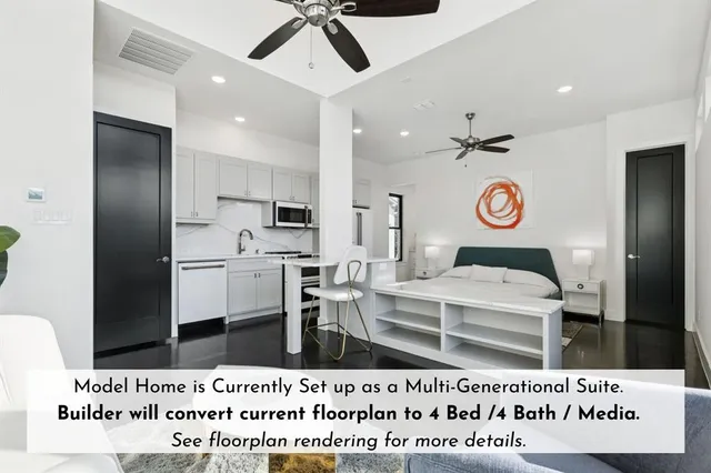 a bathroom with a sink a toilet and a large mirror