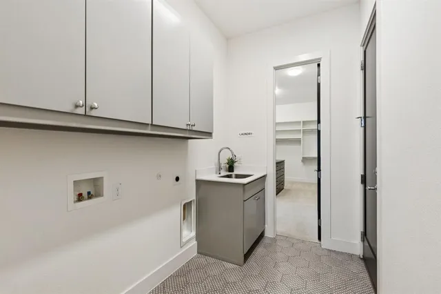 a bathroom with a granite countertop sink a toilet and a mirror