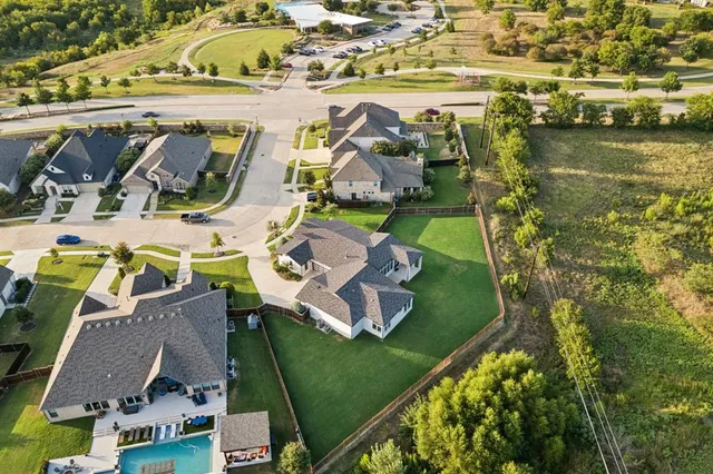 an aerial view of a house with a garden
