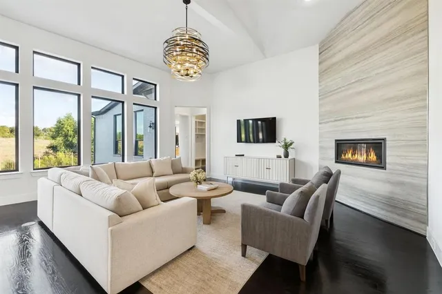 a view of a livingroom with furniture and window