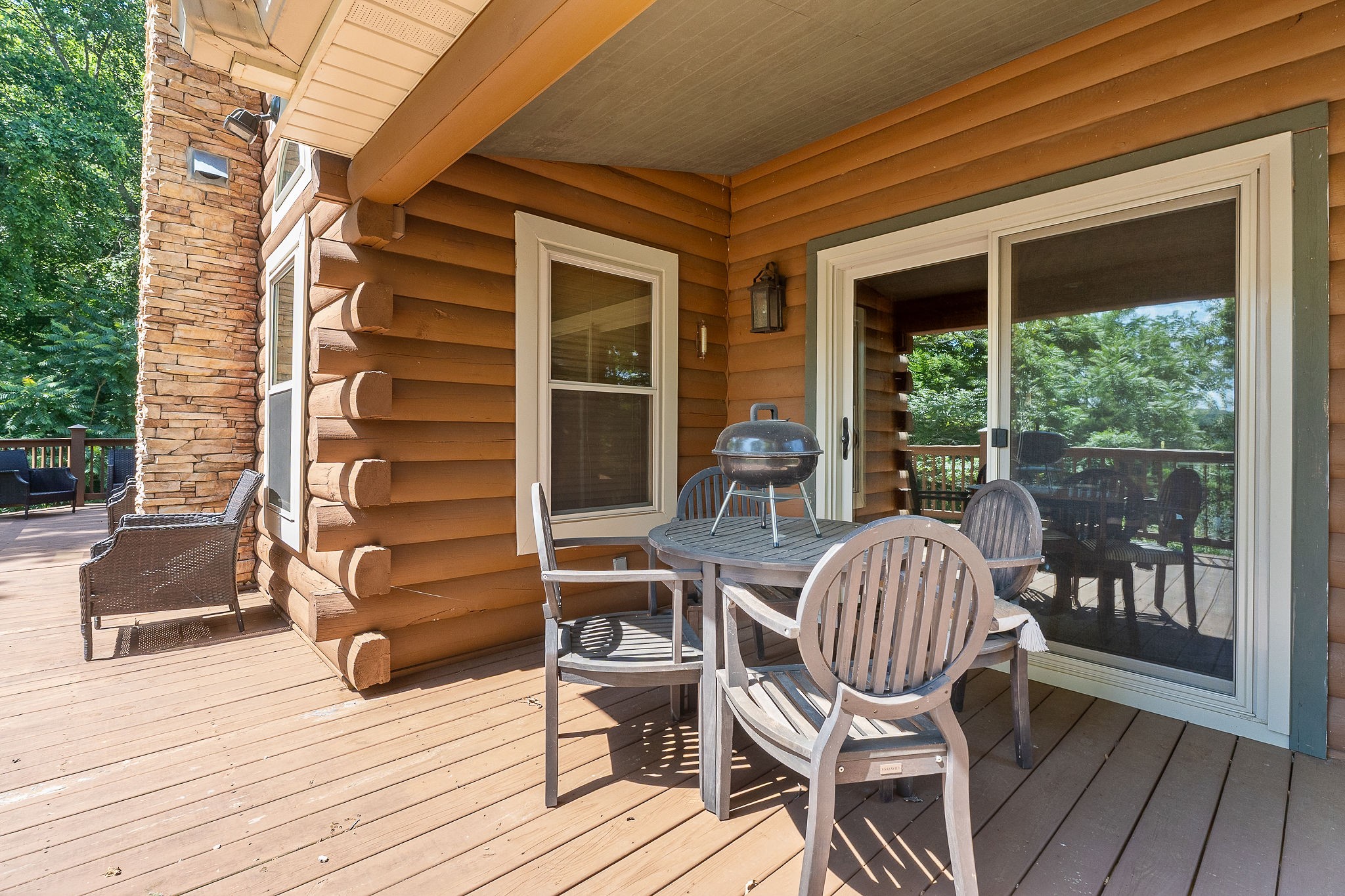 142 Rayahs Way Quebeck, TN 38579 - Photo 14 of 73 a view of a two chairs and table on the deck