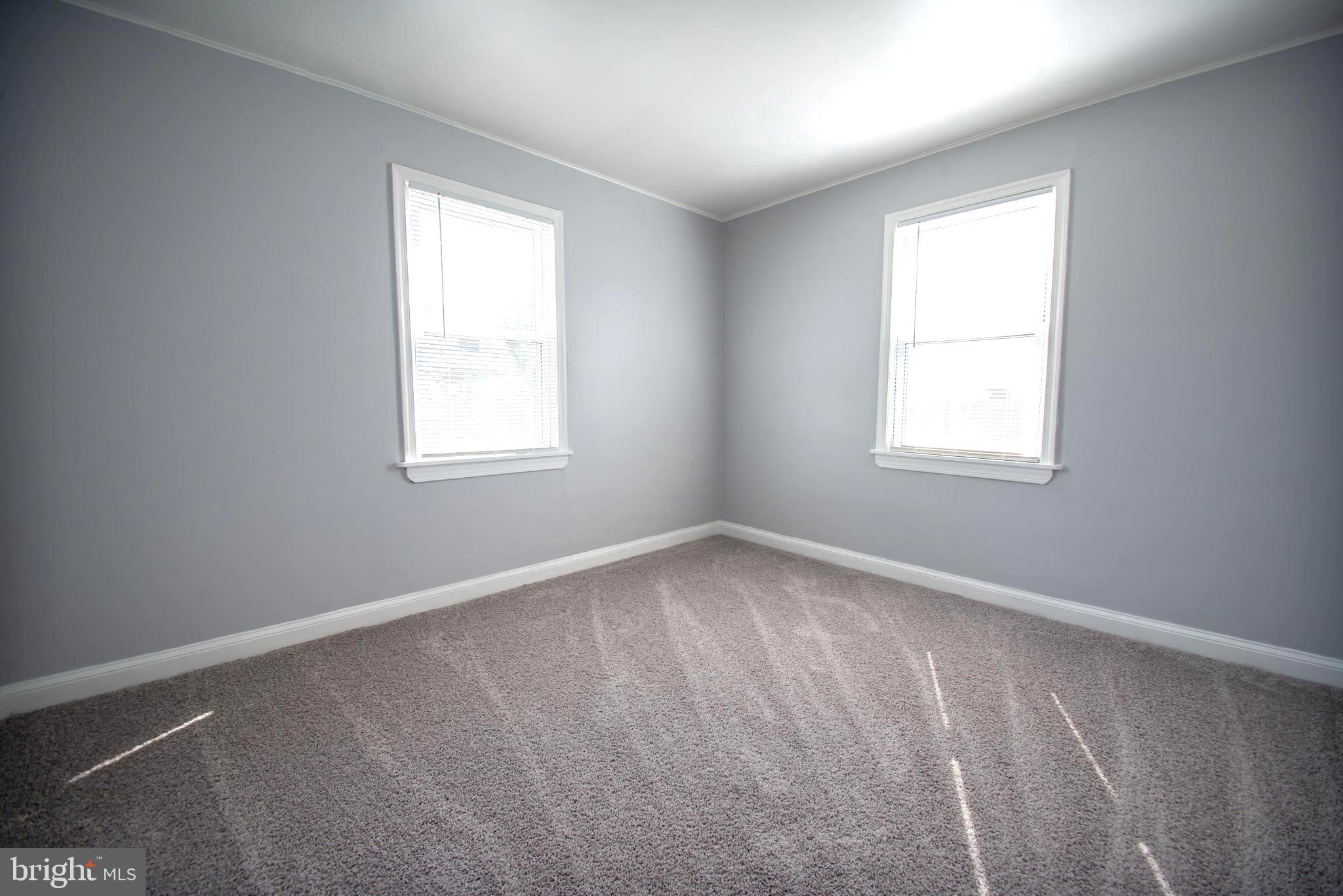 1523 Leslie Road Dundalk, MD 21222 - Photo 12 of 29 Large Bedroom Level #1 w/brand new carpet & paint
