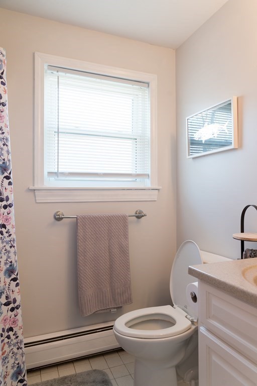 75 Fairview Park Road Sturbridge, MA 01566 - Photo 8 of 13 a white toilet sitting next to a bathroom sink