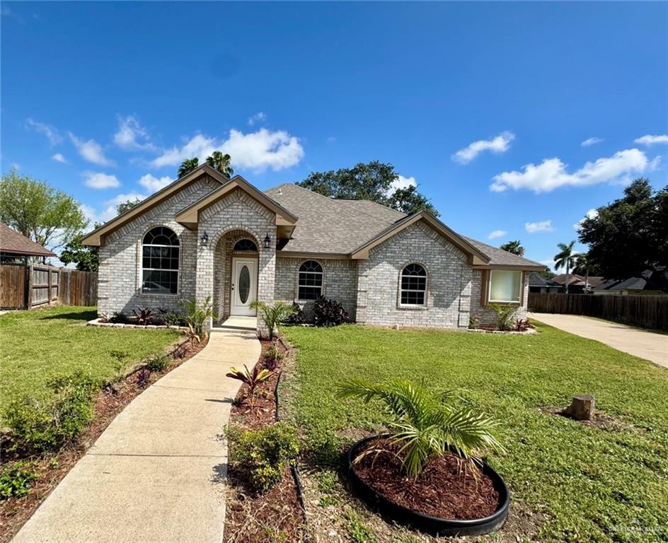2207 Turtle Court Mission, TX 78572 - Photo 2 of 22 a view of a house with a yard