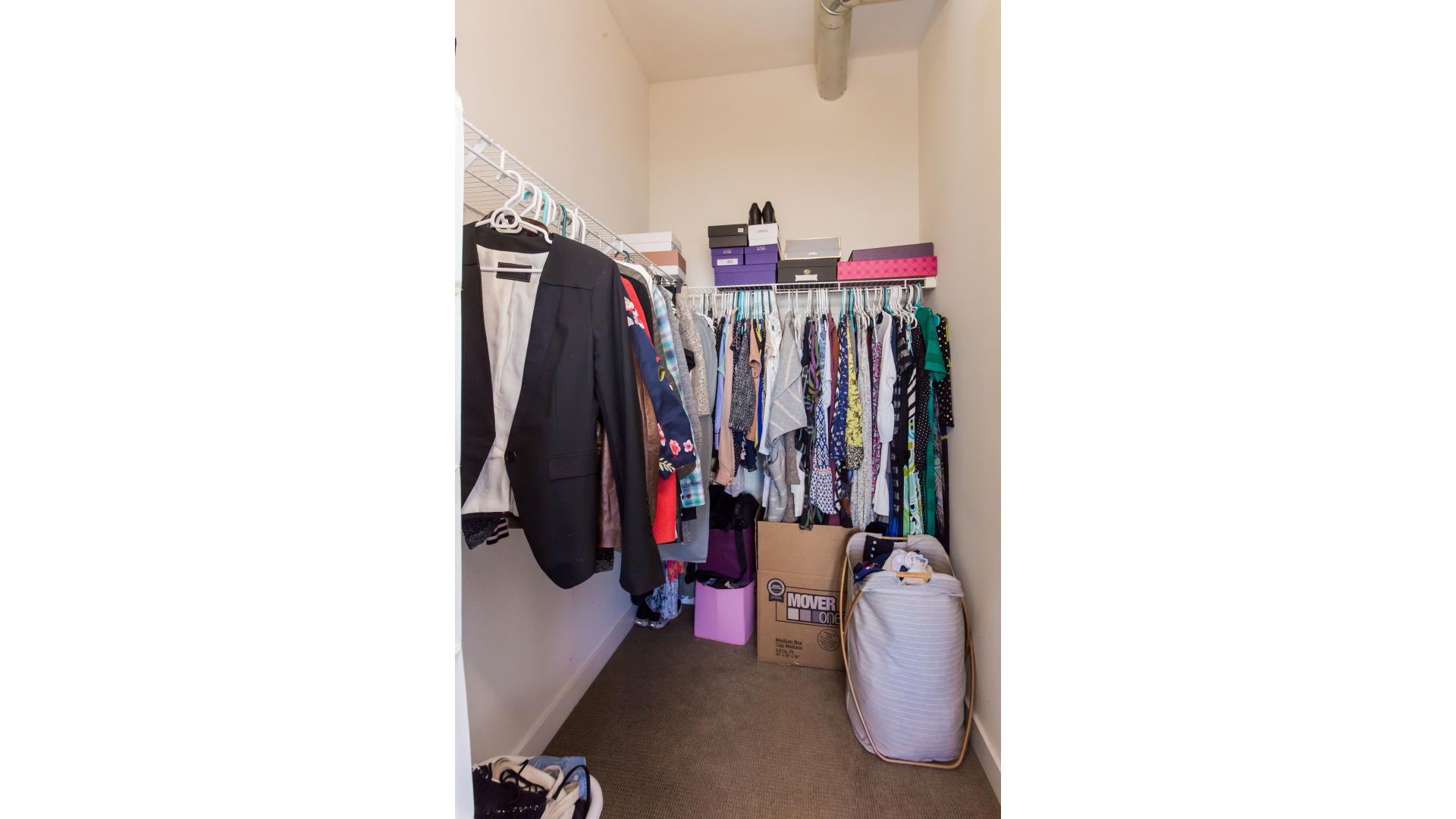 901 West Madison Street, Unit 609 Chicago, IL 60607 - Photo 16 of 22 a view of walk in closet with clothes