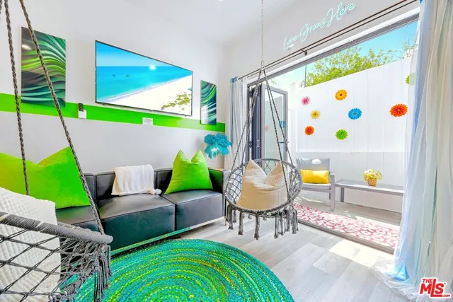 a outdoor living space with furniture and a table