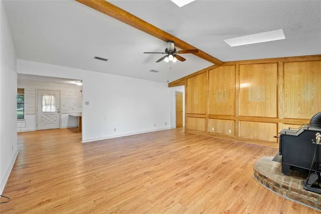 a view of a livingroom with a patio and a fireplace