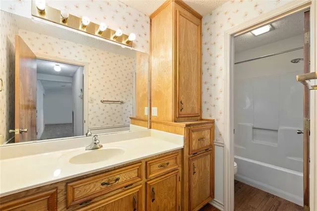 a view of swimming pool with an outdoor seating