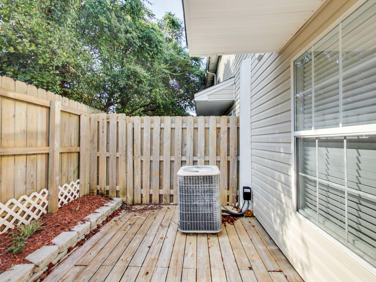 487 Keystone Road, Unit 487 Mary Esther, FL 32569 - Photo 26 of 28 a view of balcony with wooden floor and seating space