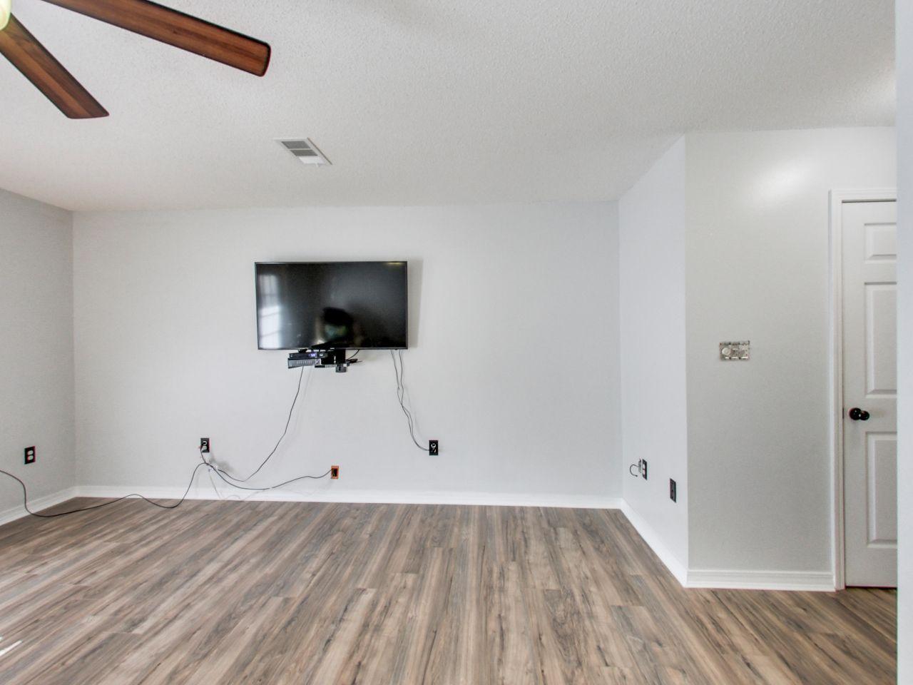 487 Keystone Road, Unit 487 Mary Esther, FL 32569 - Photo 7 of 28 a view of a room with wooden floor and wooden floor