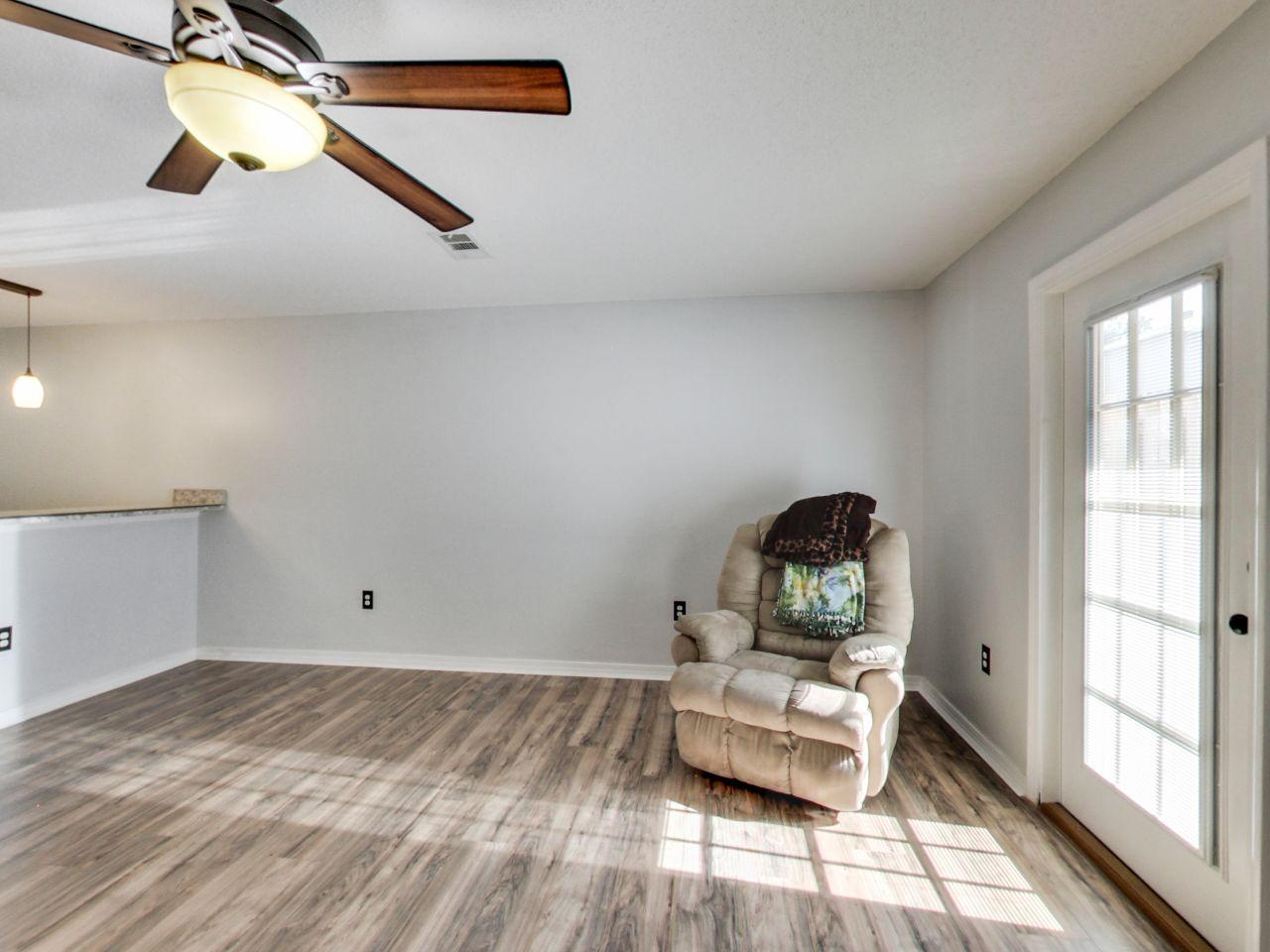 487 Keystone Road, Unit 487 Mary Esther, FL 32569 - Photo 8 of 28 a living room with furniture and a window