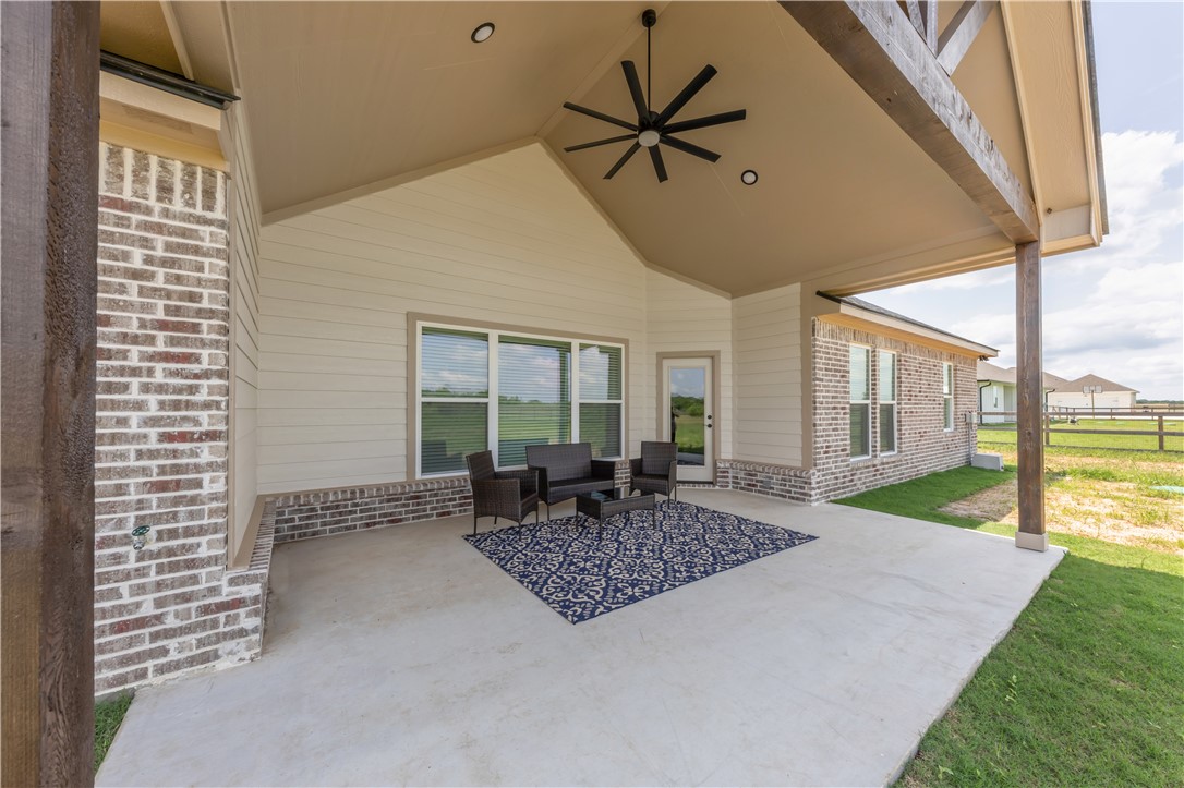 3310 Hunters Crossing Bryan, TX 77808 - Photo 30 of 34 View of patio with an outdoor living space and a ceiling fan