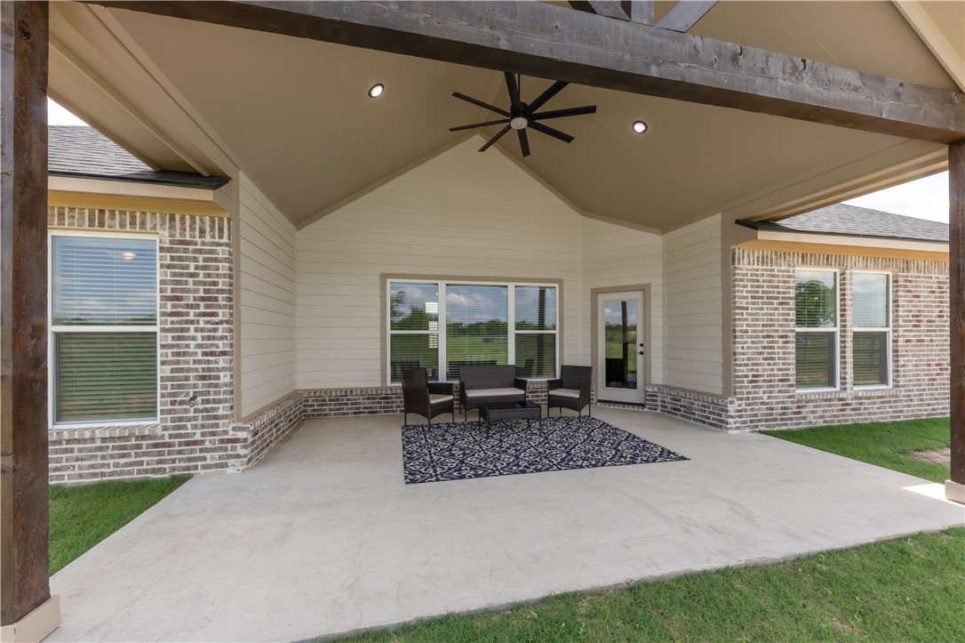 3310 Hunters Crossing Bryan, TX 77808 - Photo 34 of 34 View of patio / terrace with a ceiling fan and an outdoor hangout area