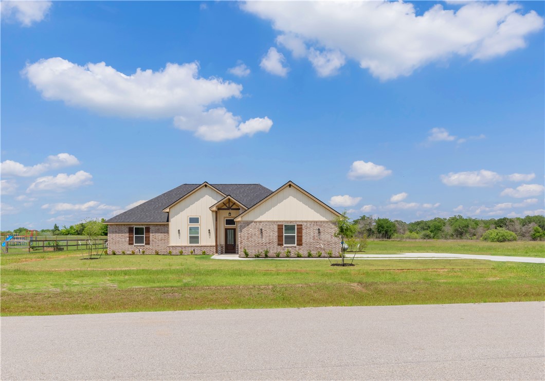 3310 Hunters Crossing Bryan, TX 77808 - Photo 4 of 34 View of front of property featuring brick siding