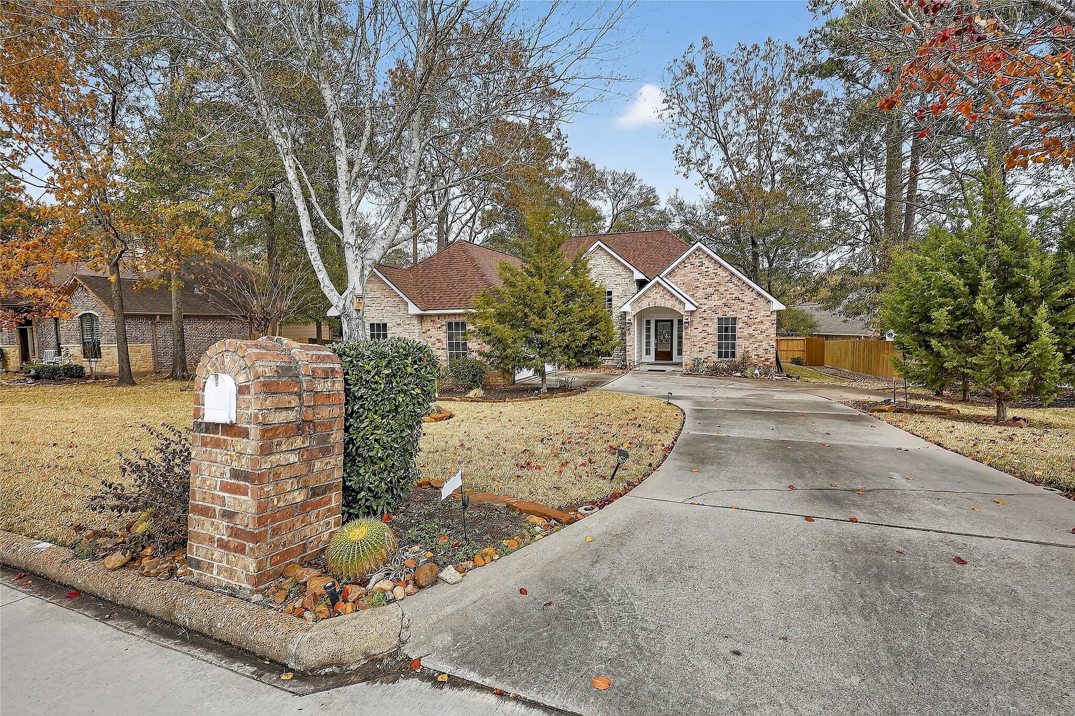 89 Dawns Edge Conroe, TX 77356 - Photo 14 of 46 Private, peaceful setting with mature landscaping and a charming exterior — offering comfort and character from the moment you arrive.