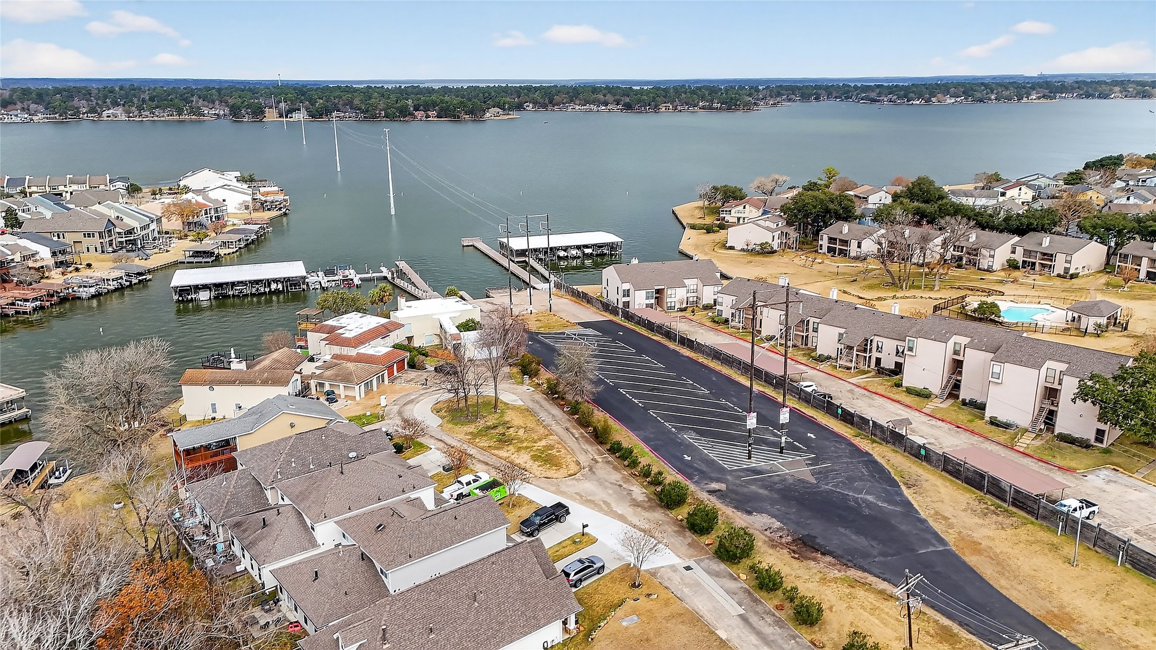 89 Dawns Edge Conroe, TX 77356 - Photo 43 of 46 Community marina and boat launch area in April Sound, offering residents convenient access to Lake Conroe along with nearby pools, townhomes, and lakeside green space.
