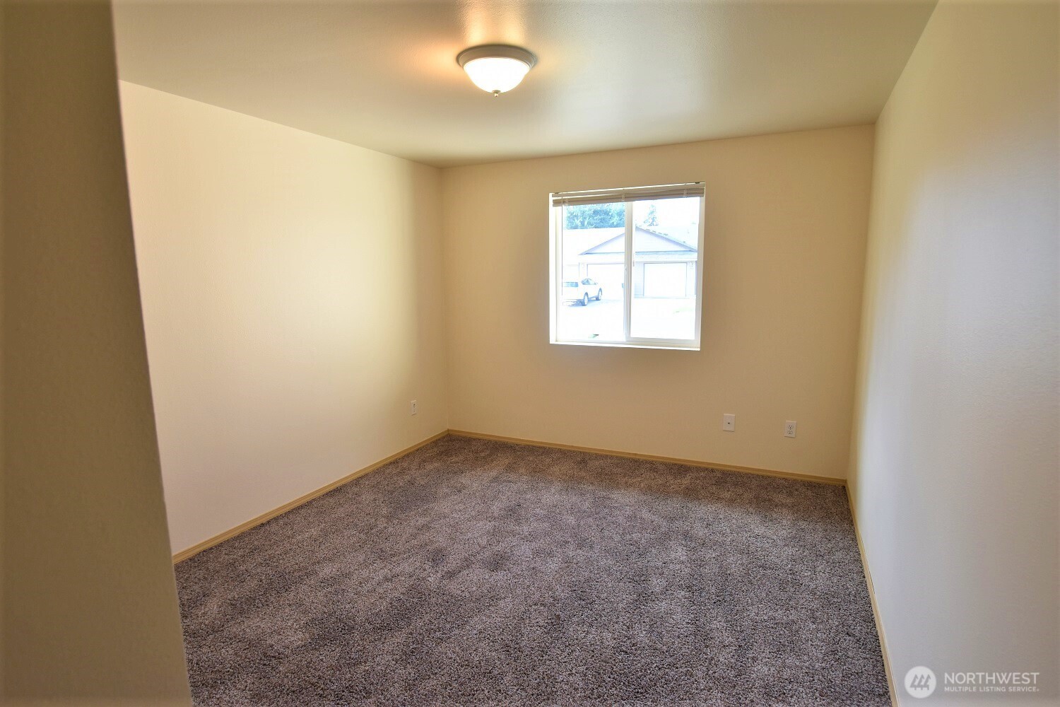 19906 Tamarack Drive Southwest Rochester, WA 98579 - Photo 5 of 12 an empty room with a window