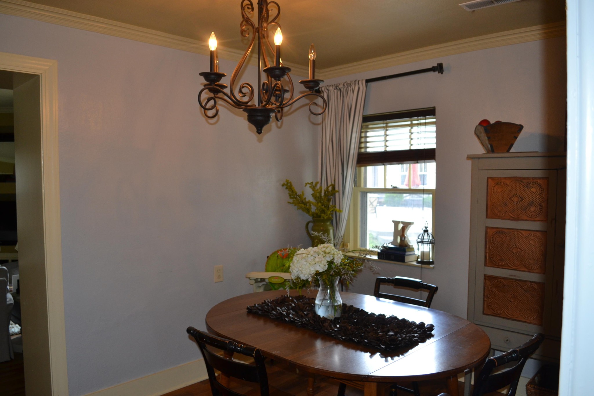 2306 Deep Draw Road Crossville, TN 38555 - Photo 21 of 40 a dining room with furniture a potted plant and wooden floor