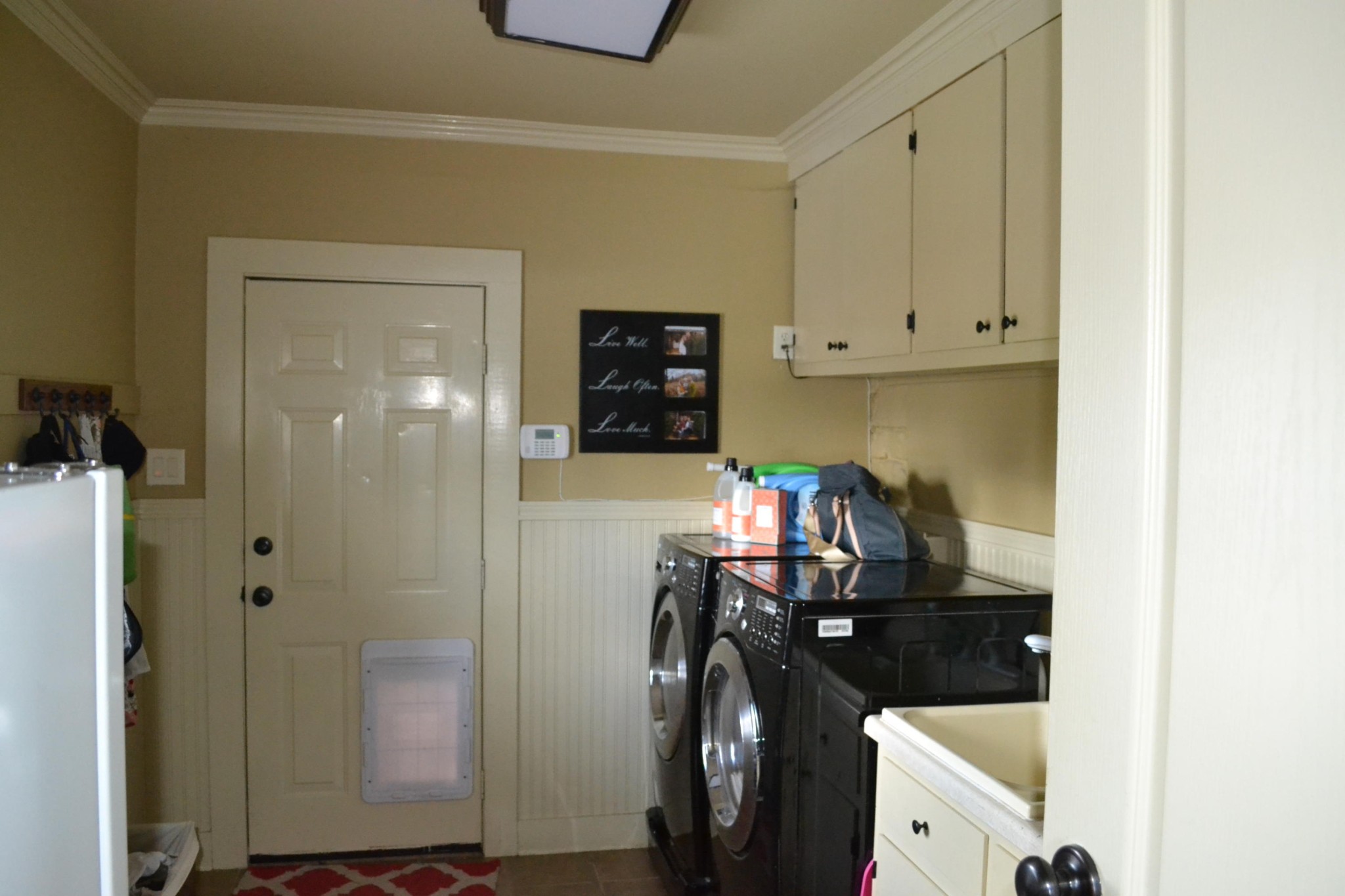2306 Deep Draw Road Crossville, TN 38555 - Photo 24 of 40 a kitchen with a refrigerator and cabinets