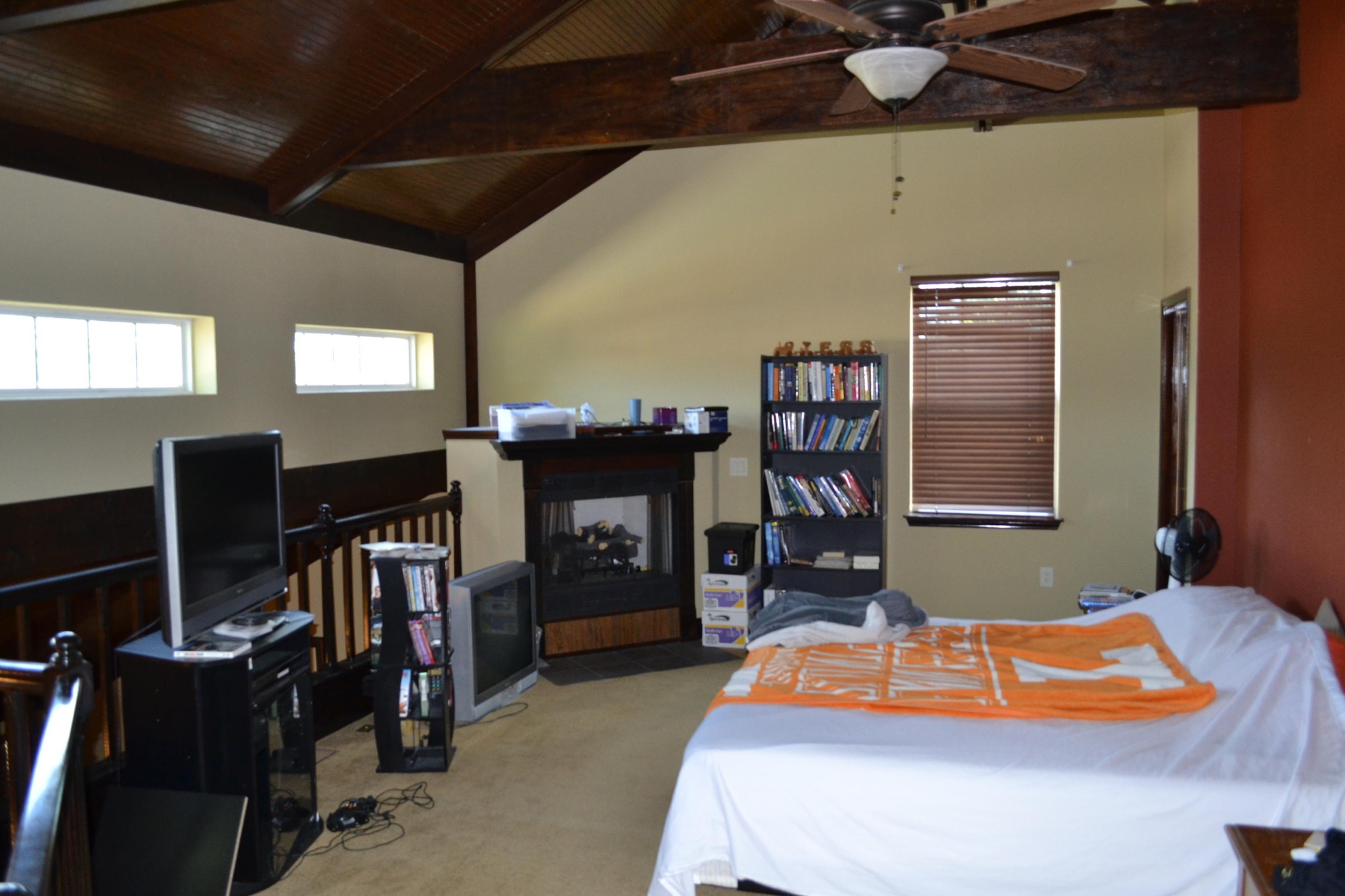 2306 Deep Draw Road Crossville, TN 38555 - Photo 40 of 40 a bedroom with a bed and a chandelier