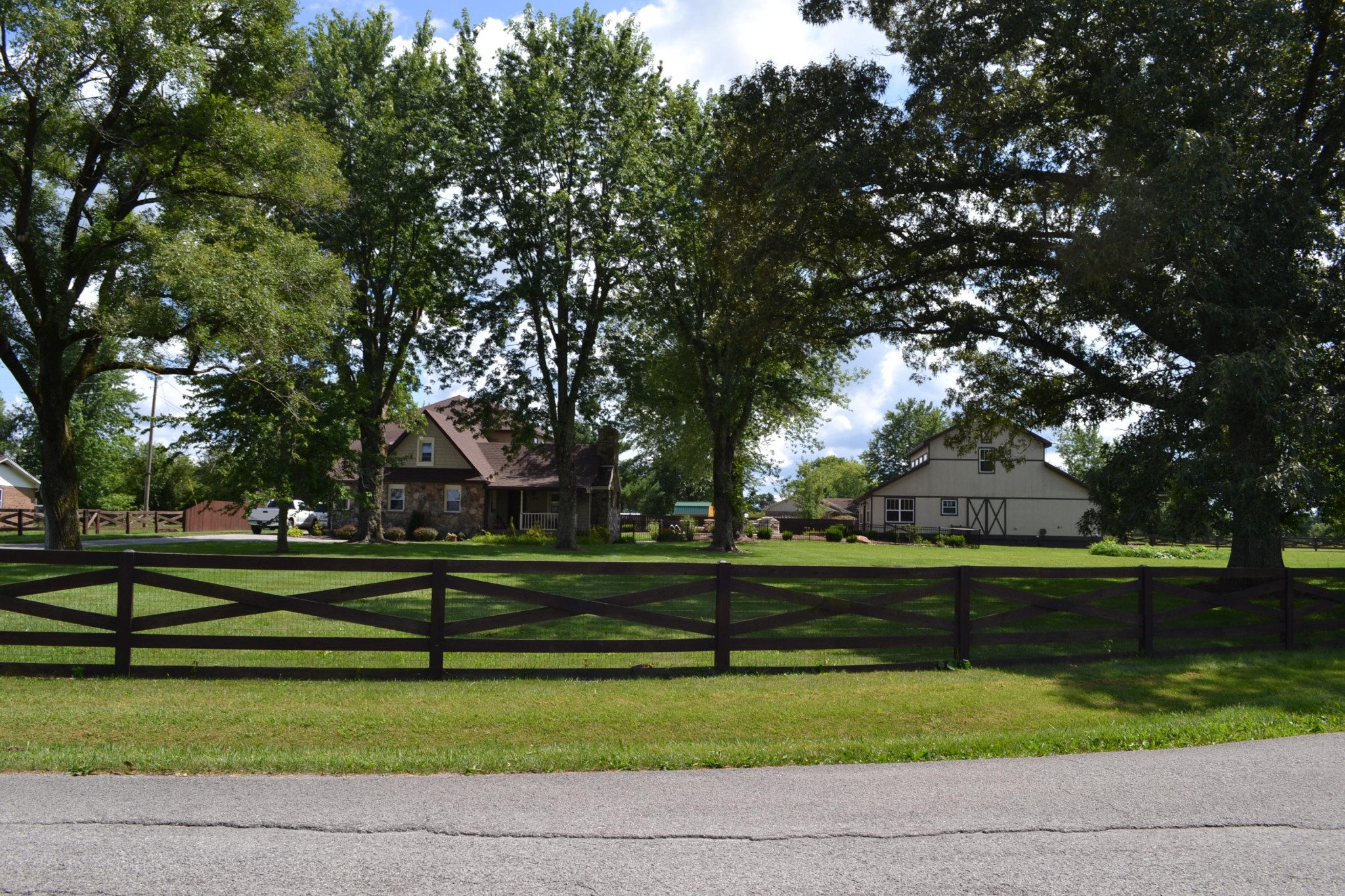 2306 Deep Draw Road Crossville, TN 38555 - Photo 4 of 40 a front view of a house with a large trees