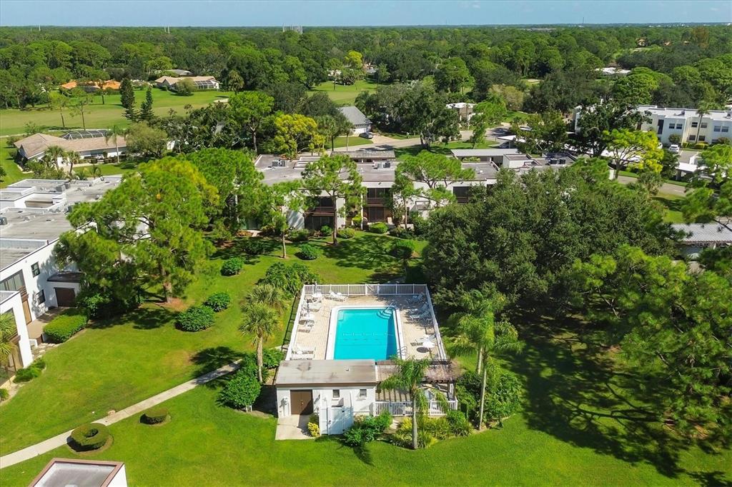5058 Marsh Field Road, Unit 8 Sarasota, FL 34235 - Photo 42 of 73 an aerial view of residential house with outdoor space