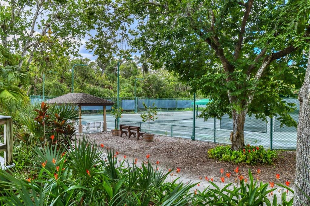 5058 Marsh Field Road, Unit 8 Sarasota, FL 34235 - Photo 59 of 73 a view of a backyard with sitting area