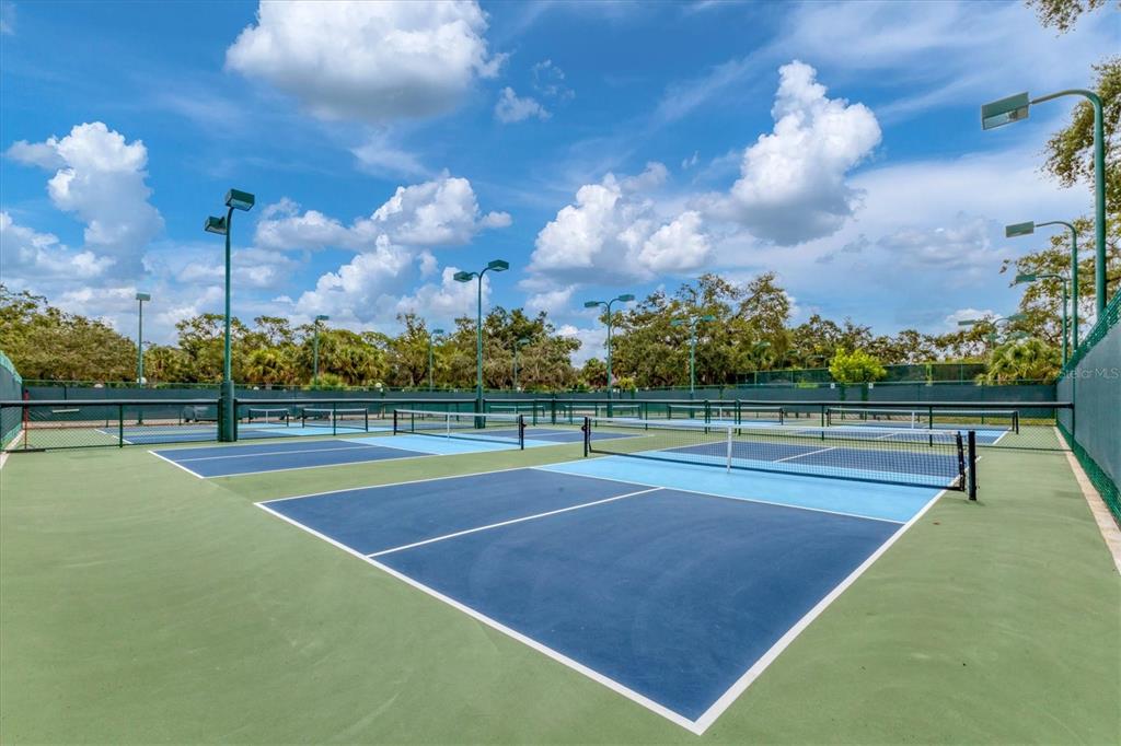 5058 Marsh Field Road, Unit 8 Sarasota, FL 34235 - Photo 69 of 73 a view of a tennis court