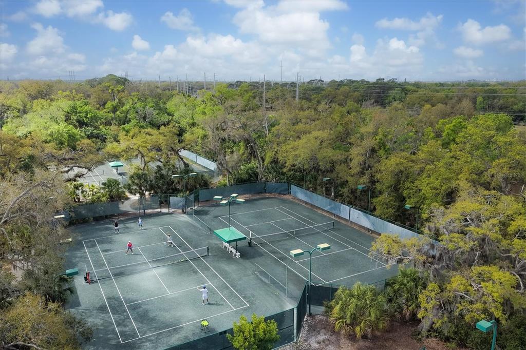 5058 Marsh Field Road, Unit 8 Sarasota, FL 34235 - Photo 72 of 73 an aerial view of residential houses with outdoor space