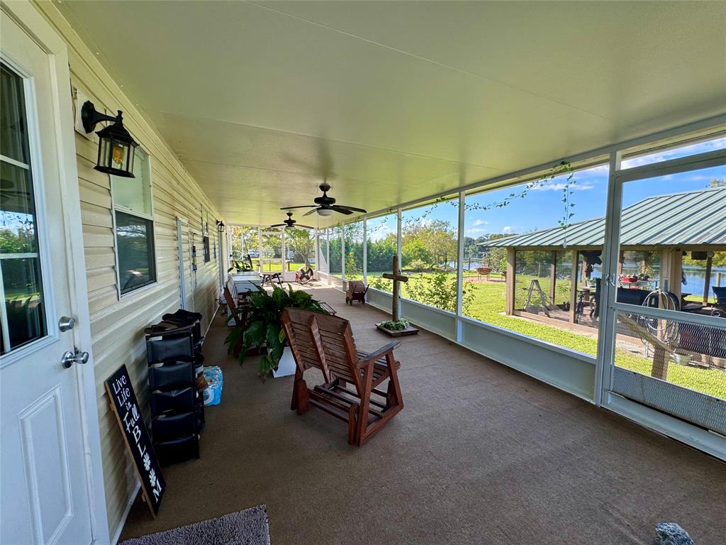 19580 Northwest 80th Drive Okeechobee, FL 34972 - Photo 12 of 34 a view of a room with gym equipment
