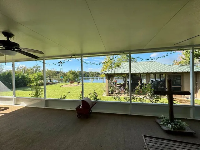 a view of a yard with a swimming pool