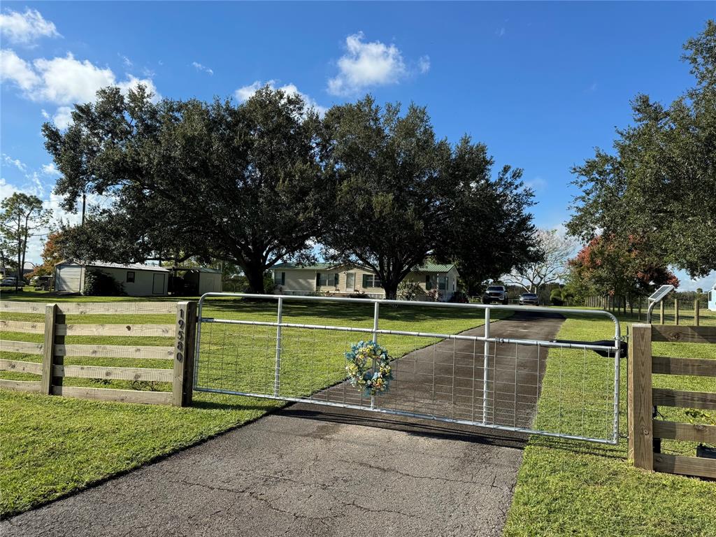 19580 Northwest 80th Drive Okeechobee, FL 34972 - Photo 15 of 34 a view of a yard with a swimming pool