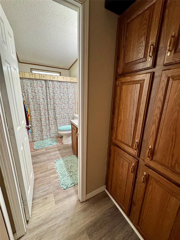 19580 Northwest 80th Drive Okeechobee, FL 34972 - Photo 20 of 34 a view of an empty room with wooden floor and a window