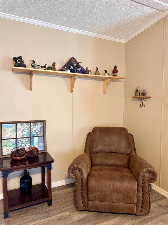19580 Northwest 80th Drive Okeechobee, FL 34972 - Photo 23 of 34 a living room with furniture and a window