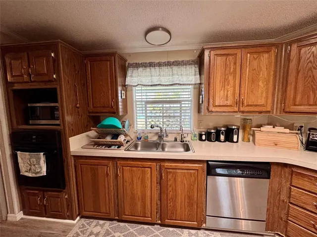 a kitchen with lots of appliances