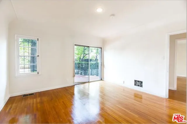 a utility room with sink dryer and washer