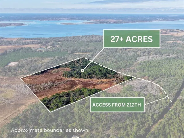 a view of a park with an ocean view