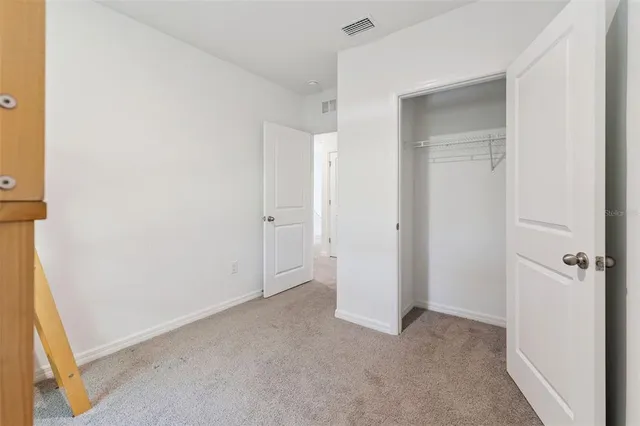 a bathroom with a tub and window