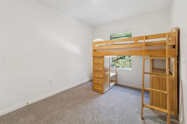 a bathroom with a double vanity sink toilet and shower
