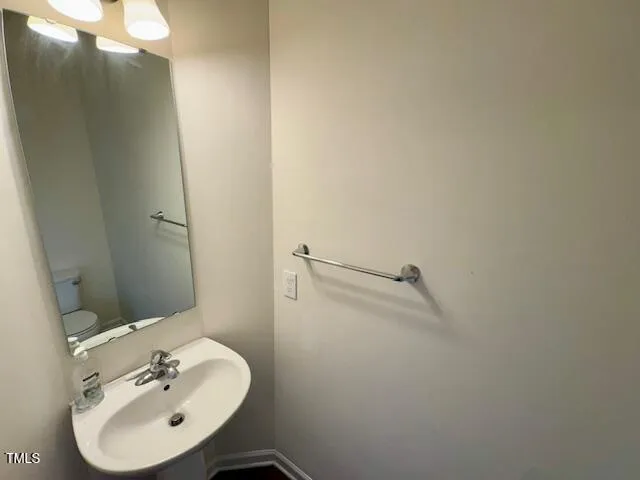 a view of a room with a hallway