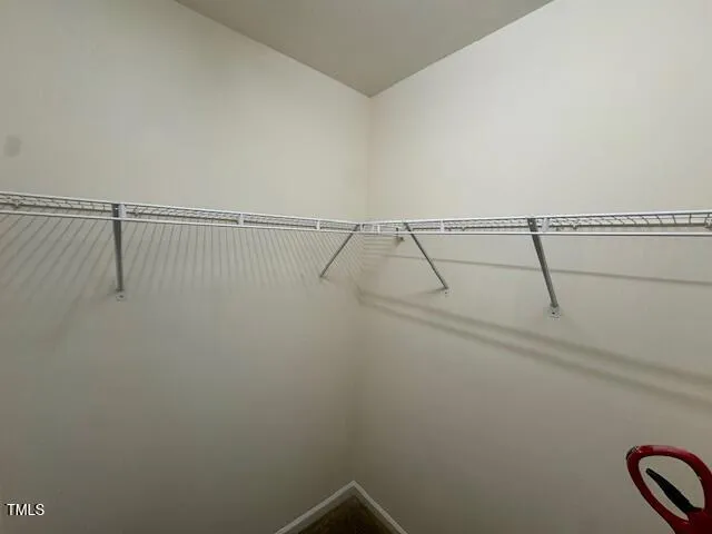 a bathroom with a sink a mirror and a shower