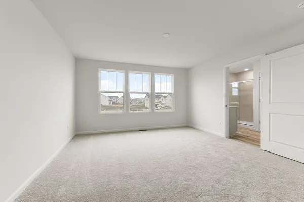 an empty room with a empty space and window