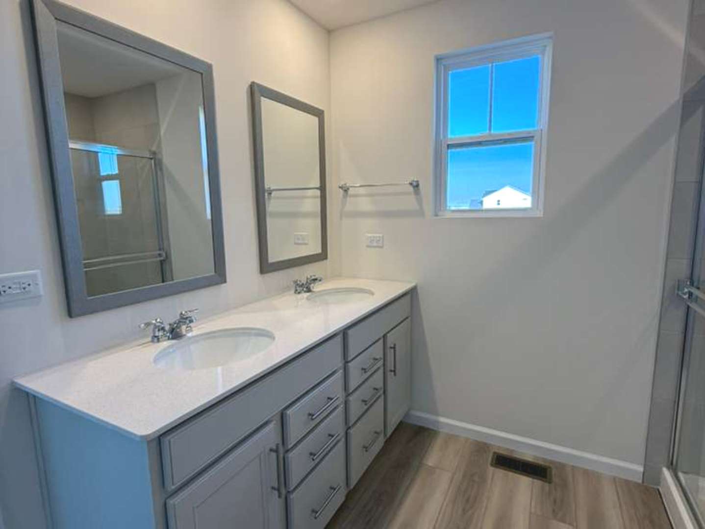 672 Switchgrass Way, Unit 58005 Bolingbrook, IL 60490 - Photo 12 of 19 a bathroom with a sink and a mirror